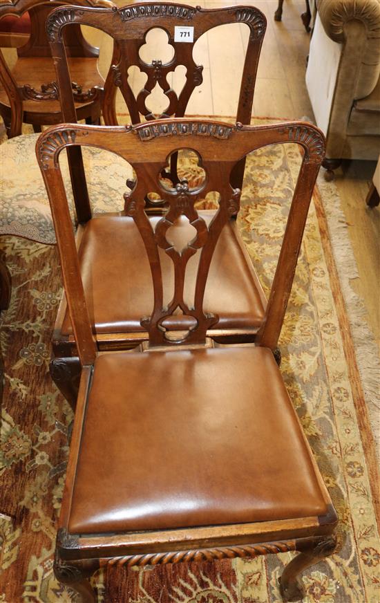 A pair of Chippendale style mahogany dining chairs